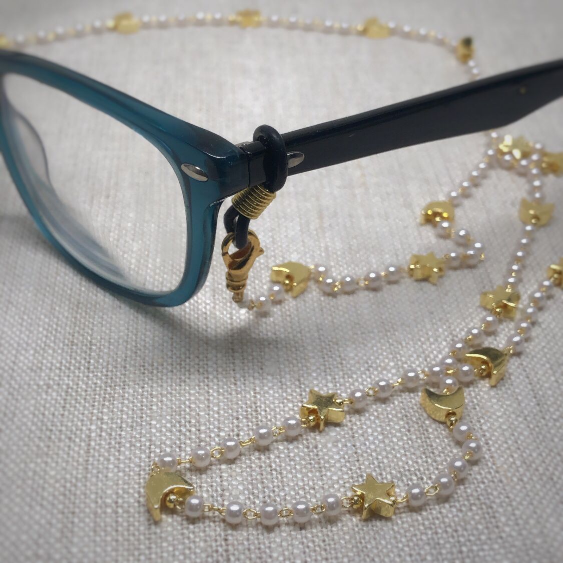 Sujetador de lentes Cosmic